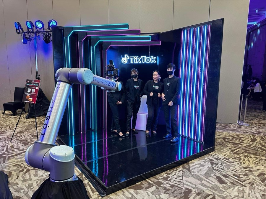 GlamBot in an LED photo booth activation branded for TikTok